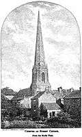 A church, its spire rising far above the few trees and houses around it.