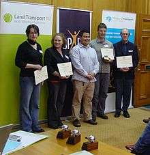 Hon Charles Chauvel standing with the finalists and the winner of the Best Cycle Facility Award category