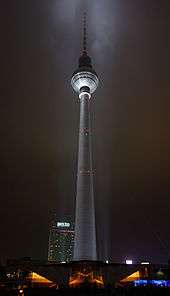 TV tower, lit up at night