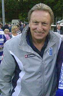 Neil Warnock posing for a photo