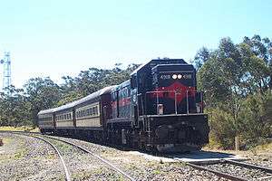 A heritage train stops at Summit Tank platform