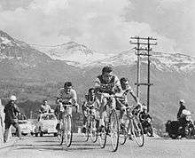 Cyclists riding together.