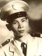 Cleancut young man wearing a white suit dress uniform and a uniform cap