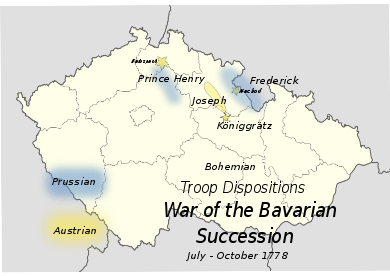 An outline map of 20th century Czechoslovakia includes most of Bohemia; the positions of the armies are marked in yellow and blue, showing Joseph's army (yellow) in a line of fortifications and surrounded at front and rear by Henry and Frederick (blue).