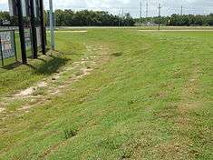 Berm toward left field line