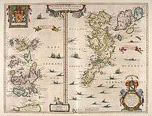 An old map of two island groups with the "Orcades" at left and "Schetlandia" at right. A coat of arms at top left shows a red lion rampant on a yellow shield flanked by two white unicorns. A second heraldic device is shown at bottom right below the "Oceanus Germanicus". This has two mermaids surrounding a tabula containing very small writing, topped by a yellow and blue shield.