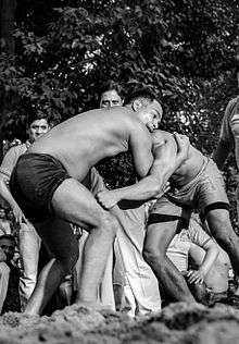 Two players (boli) playing Boli khela in Chittagong