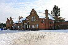 Long low red brick building