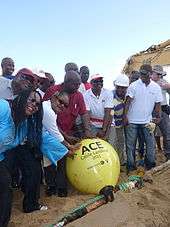 CCL members touch lead buoy during cable landing.