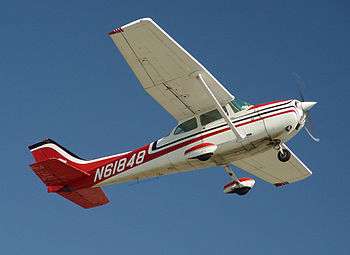 Cessna 172 Taking off from runway.