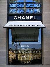 Chanel's headquarters storefront window at the Place Vendôme Paris with awning