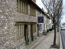 Stone building with sign saying Chard Museum