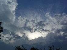 A picture showing the cirrus clouds lancing out from the anvil of the thunderstorm. Picture taken just before the lower mass of the cumulonimbus cloud went over the photographer.