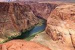 A large river flows through a deep canyon.