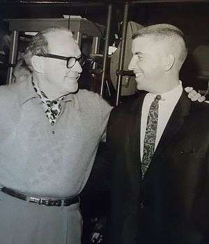 Two men in a black and white photo.