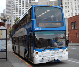 A double-decker bus at a bus stop