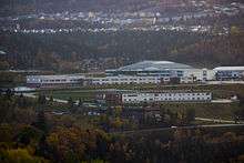 Corner Brook Regional High (upper white building).