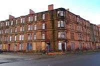 Victorian sandstone tenements in Ardenlea Street, Dalmarnock that were originally renovated as part of the GEAR (Glasgow East Area Renewal) scheme in the late 1970s, have seen their residents systematically rehoused in recent years, thus being allowed to fall into a dilapidated state once more. They have now been totally demolished as part of the 2014 Commonwealth Games athletes village masterplan by RMJM.