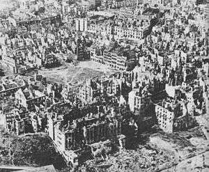 Black and white aerial photograph of destroyed Warsaw from January 1945.