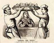 Disraeli and Derby, caricatured as chefs, set a dish before Queen Victoria. On the outside of the dish are the names of Conservative parliamentary bils; within are the faces of Liberal politicians