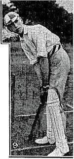 young man in cricket whites at the wicket