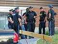 Elliot Lake Algo Centre Mall Police talking and guarding the barricade.jpg