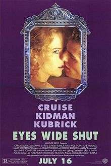 A framed image of a nude couple kissing – she with her eye open – against a purple background. Below the picture frame are the film's credits.