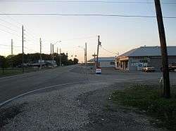 The view northwest from the Farmers Co-op Gin is of a few local businesses.