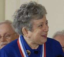 head of Ajzenberg-Selove with ribbon of medal visible around her neck