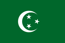 Green flag with a white crescent containing three five-pointed white stars.