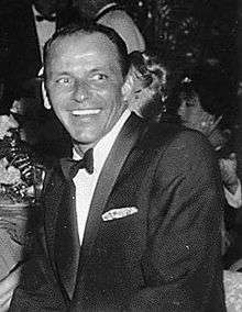 Black and white photo of Frank Sinatra at Girl's Town Ball in Florida (1960).