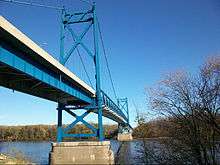 A bridge crosses a river