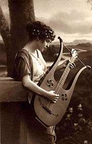 A painting depicting a girl with a lyre-guitar.