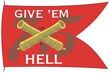 Battle flag with red background with the number 75, crossed canon barrels and phrase "Give 'em Hell"