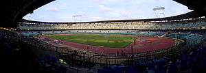 A panoramic view of a cricket ground