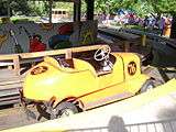 Yellow car in station at Kennywood Auto Race.