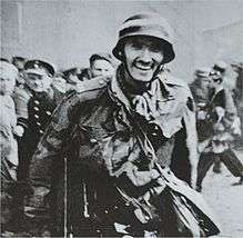 Witold Kieżun caught on documentary footage during the Warsaw uprising, 23 August, with a ceased HMG after a successful assault