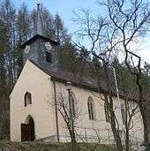 Church surrounded by trees