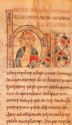  Illuminated manuscript with a forward facing man in the middle of the large H. Man is carrying a crozier and his head is surrounded by a halo