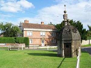 Small building used as a prison with obelisk.