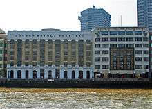 Photo of hospital with river in front of it