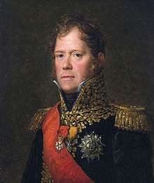 Painting of a red-headed man with long sideburns and blue eyes. He wears a dark blue military uniform with a high collar, a red sash and much gold braid.