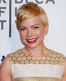 Michelle Williams is smiling for the camera