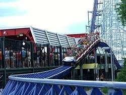 Roller coaster train on a small hill