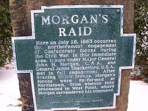 aluminum plaque bolted to sandstone. Plaque is shape of outline of Carroll County, Ohio, with raised letters that read : MORGAN'S RAID Here on July 26, 1863 occurred the northernmost engagement of Confederate forces during the Civil War. In this immediate area, troops under Major General John H. Morgan, C.S.A., and General James Shackleford, U.S.A., met in full engagement. After evading Union troops, Morgan's forces were re-formed at Norristown, from whence they proceeded to West Point, where Morgan surrendered his command.  CARROLL COUNTY HISTORICAL SOCIETY 1969