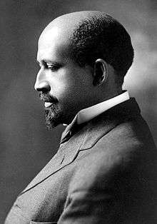 An African American man, sitting for a posed portrait