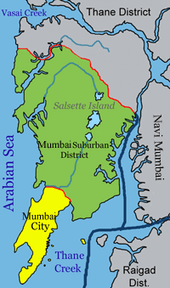  Mumbai is on a narrow peninsula on the southwest of Salsette Island, which lies between the Arabian Sea to the west, Thane Creek to the east, and Vasai Creek to the north. Mumbai's suburban district occupies most of the island. Navi Mumbai is east of Thane Creek, and the Thane District is north of Vasai Creek.