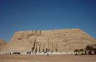 A picture of a large, trapezoidal-shaped stone monument.