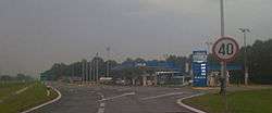 Approach to Novska rest area. A filling station is visible in the photo foreground.