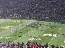 American football players during a play